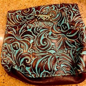Patricia Nash turquoise clutch bag.